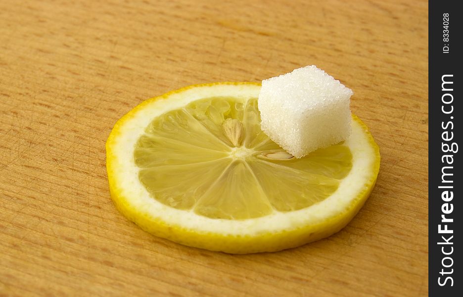 Lemon and sugar on board for cut