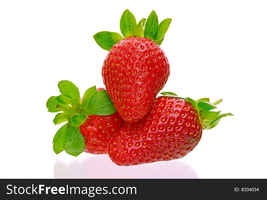 Three delicious strawberries isolated on white background