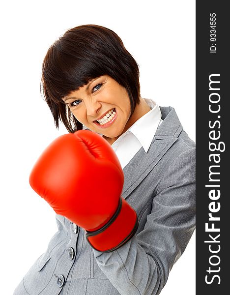 Portrait of beautiful and young business woman wearing boxing gloves. Portrait of beautiful and young business woman wearing boxing gloves
