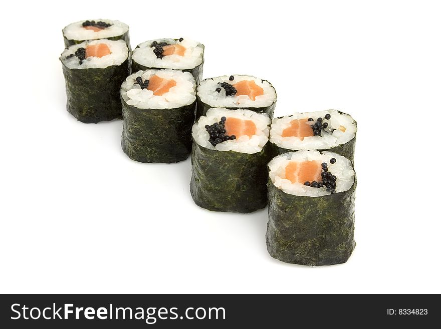 Sushi rolls with caviar and salmon are isolated on the white background