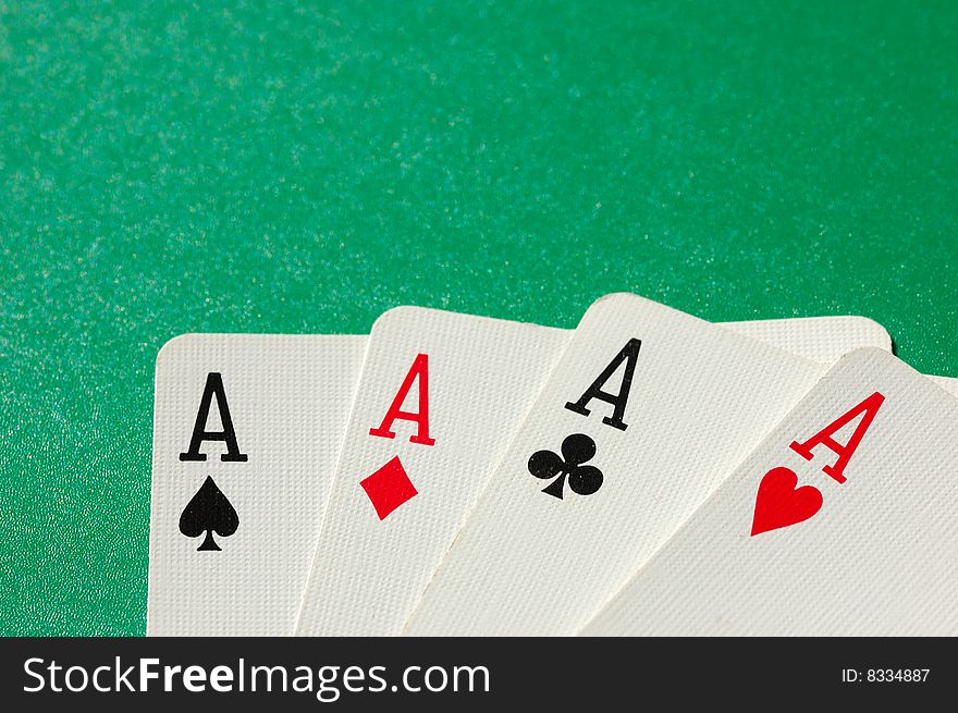 Complete set of aces on green background. Complete set of aces on green background