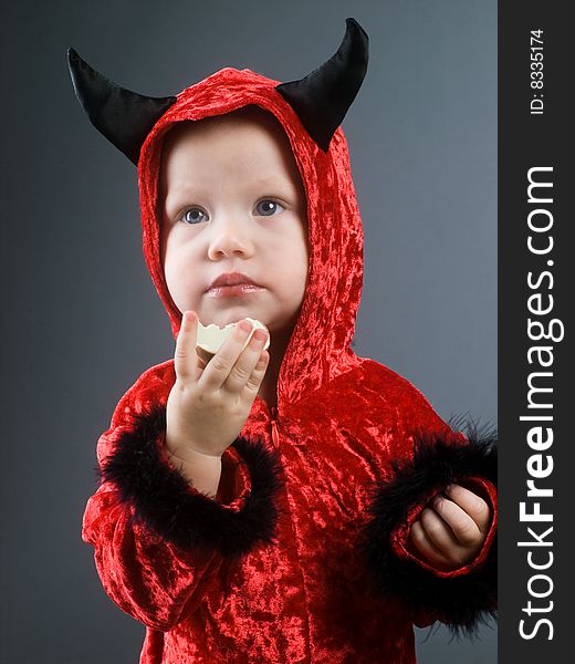 Cute baby dressed like devil. Cute baby dressed like devil