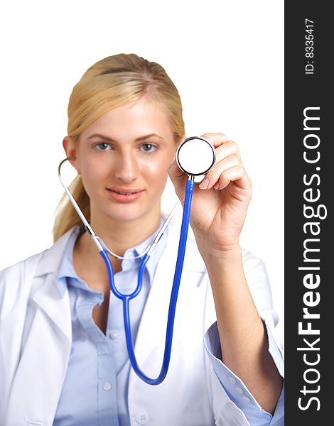 Woman Doctor Holding Stethoscope in focus isolated on white