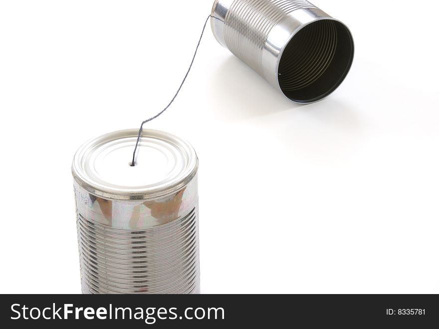 A homemade toy telephone out of tin cans and a string. A homemade toy telephone out of tin cans and a string.