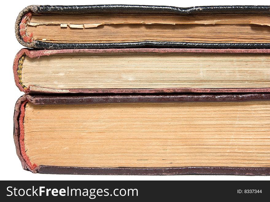 Three antique book isolated on white.