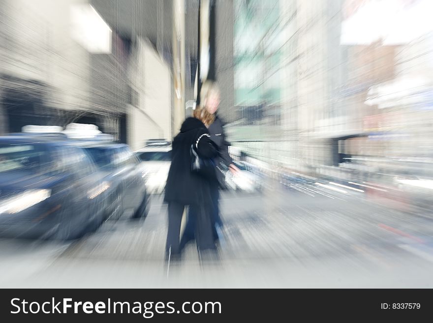 Elderly Woman Walking Across The Street