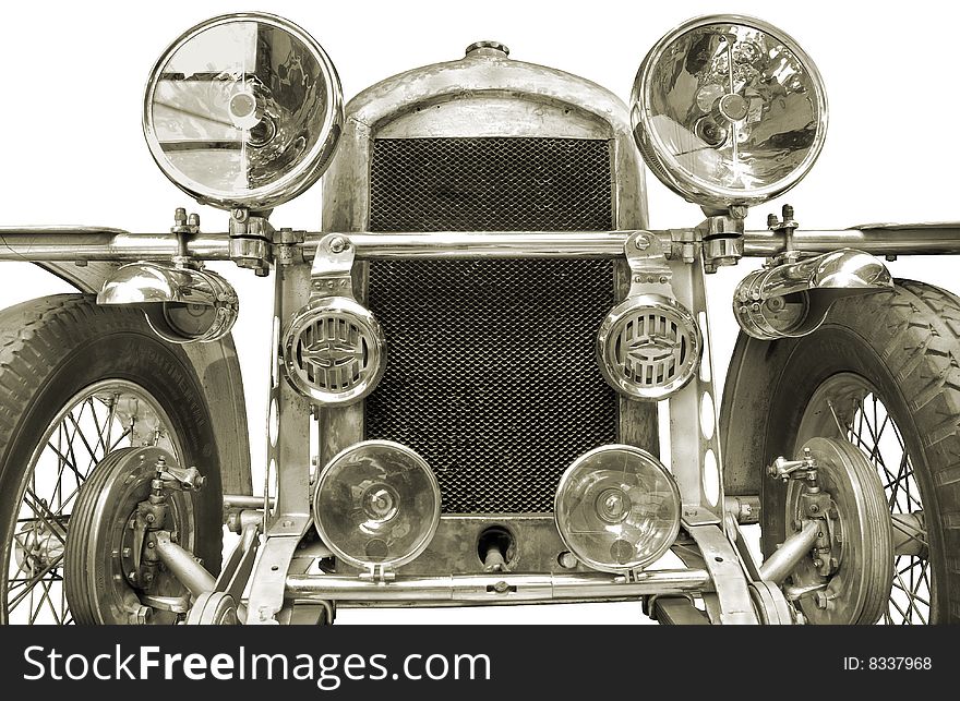 The front of antiquarian car isolated over white with clipping path. The front of antiquarian car isolated over white with clipping path.