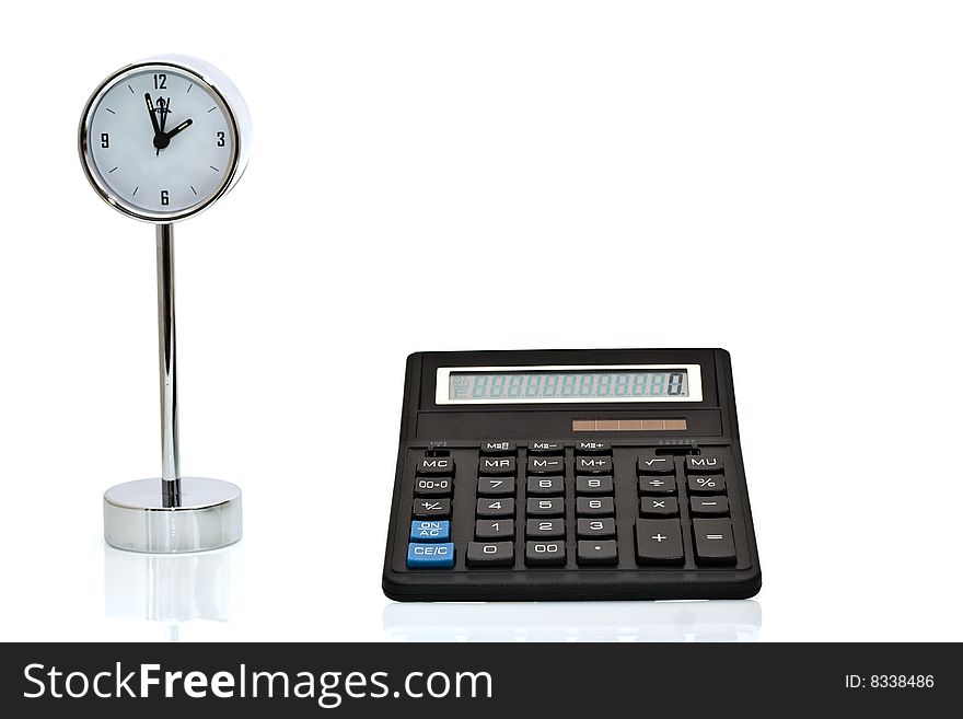 Calculator and clock on a white background