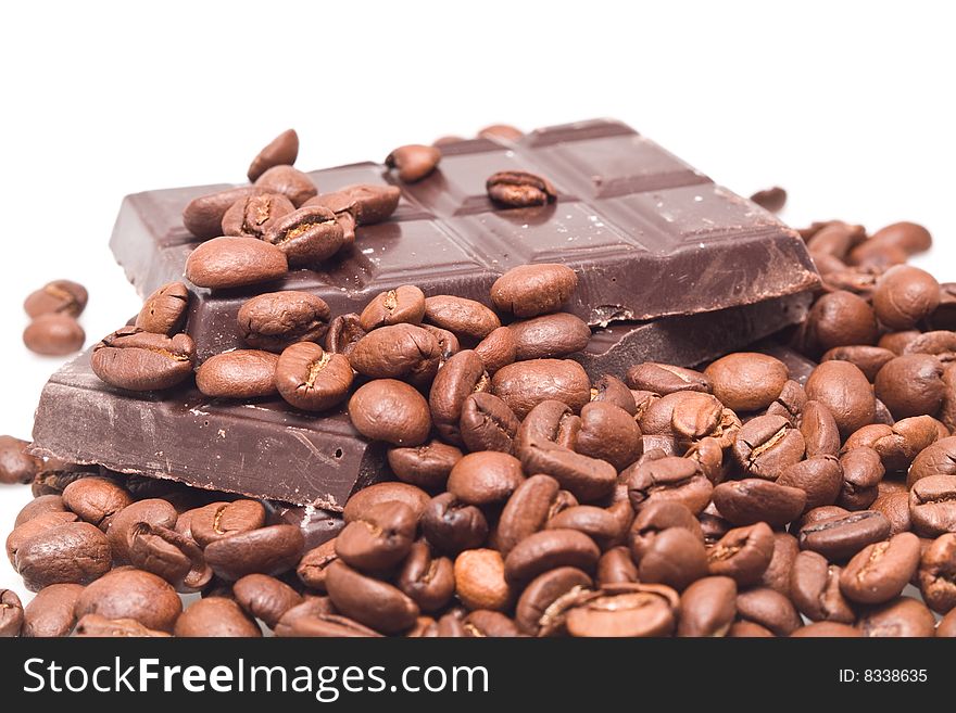 Chocolate and coffee on a white background. Chocolate and coffee on a white background