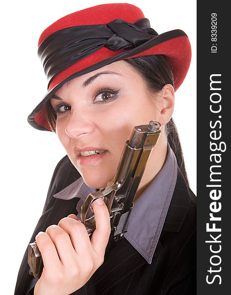 Attractive brunette woman with gun. over white background