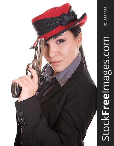 Attractive brunette woman with gun. over white background