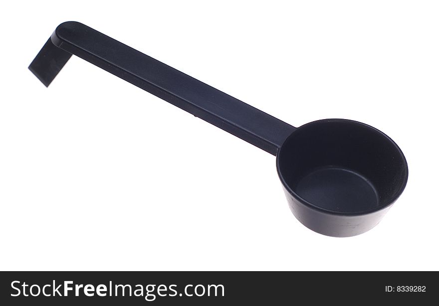 Plastic spoon for coffee grinder. Isolated on the white. Plastic spoon for coffee grinder. Isolated on the white.