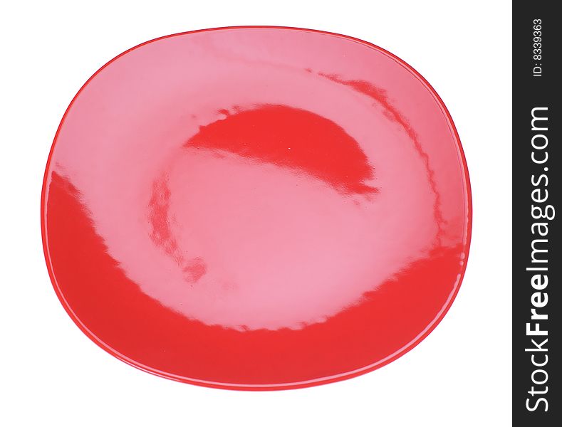 Red ceramic plate isolated on the white. Red ceramic plate isolated on the white.