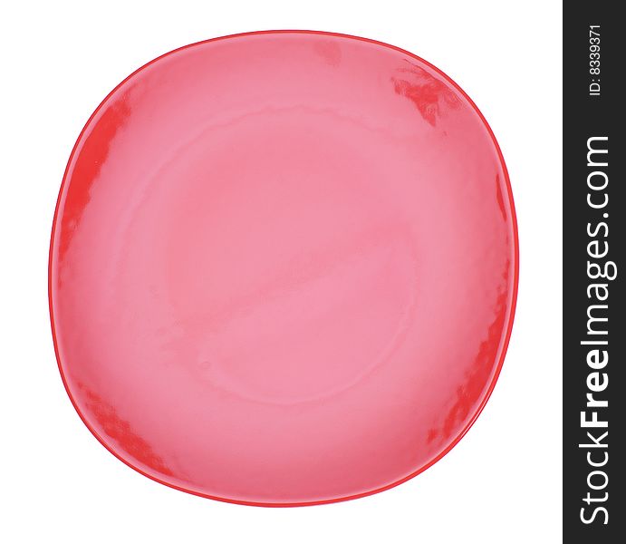 Red ceramic plate isolated on the white. Red ceramic plate isolated on the white.