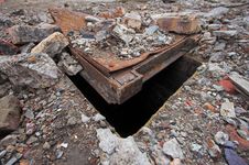 Manhole Covered With Rubble. Stock Image Manhole Covered With Rubble. Stock Image