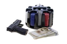 Gun, Chesspieces And Money Royalty Free Stock Photography