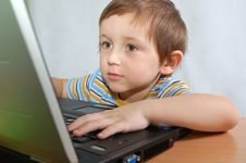 Little Boy With Notebook Stock Images