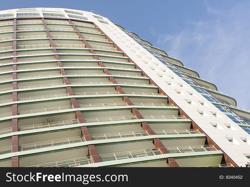 Modern office building on a background of blue sky