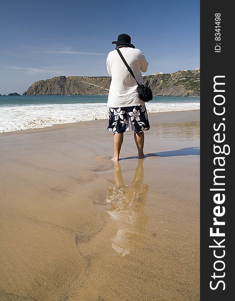 Male Photographer On The Beach