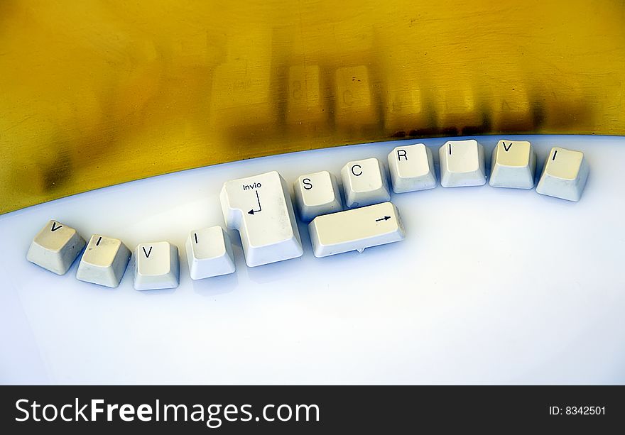Keyboard keys composition over a yellow and white background