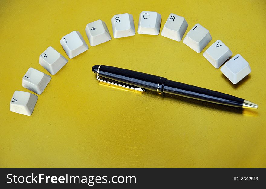 Keyboard keys composition with pen on a yellow and white background. Keyboard keys composition with pen on a yellow and white background