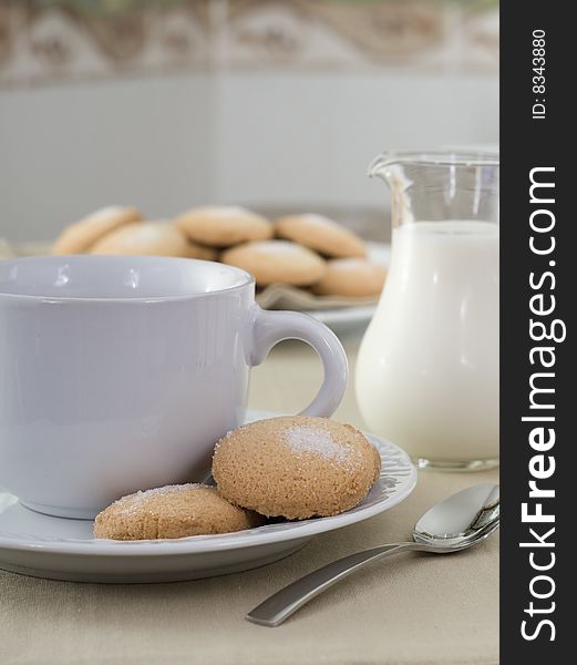 Breakfast cup of milk and cookies with sugar. Breakfast cup of milk and cookies with sugar