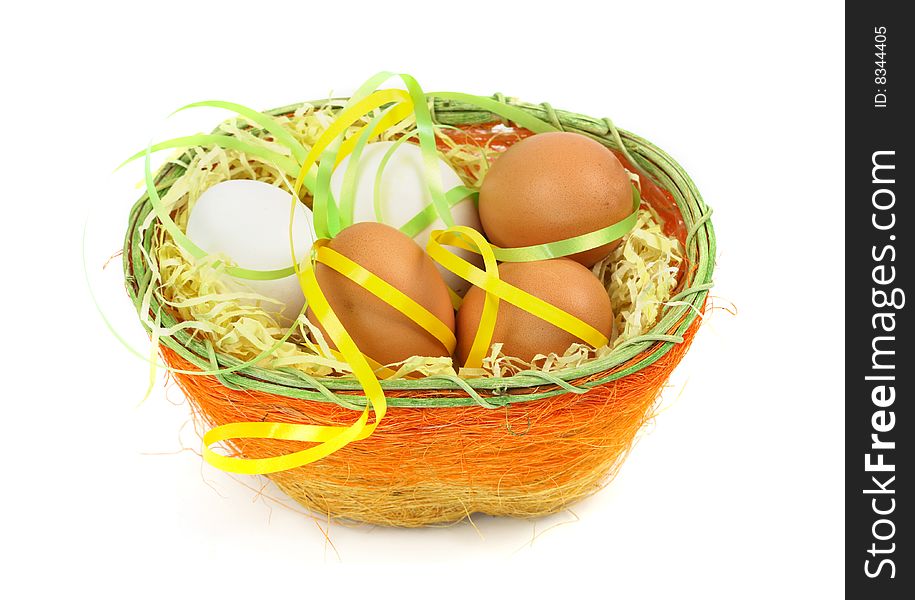 Easter ggs in basket on white background. Easter ggs in basket on white background