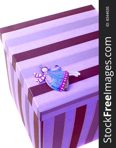 Closed gift box with decorative angel