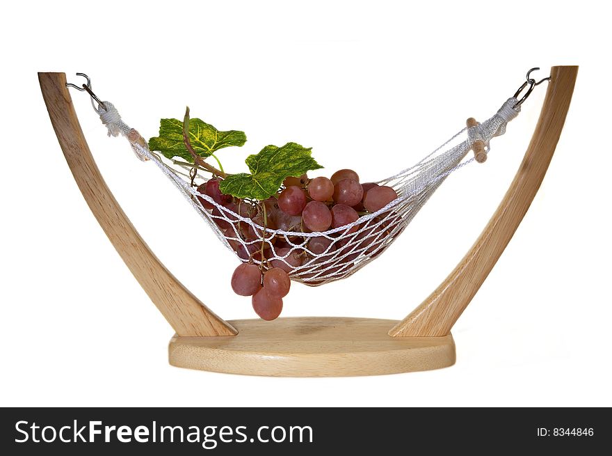 Ripe Red grapes in a vase in hammock form