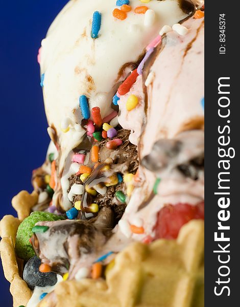 Close up shot of melting ice cream on green background