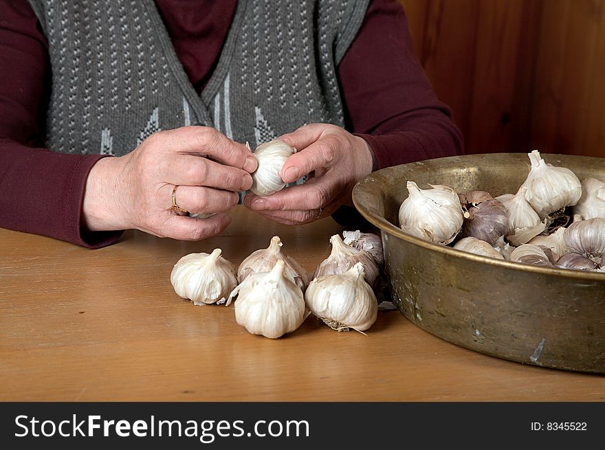 The Old Woman Touches Garlic