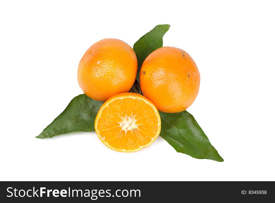 Ripe juicy tangerines on a white background