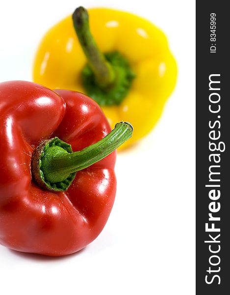 Red and yellow pepper isolated on white. Red and yellow pepper isolated on white