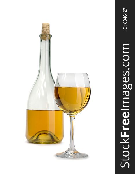 Glass and bottle of excellent white wine on a white background