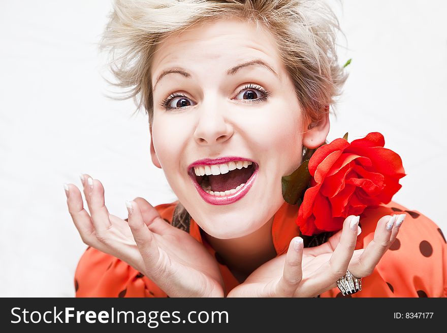 Young blond beautiful woman in hysterical gesture. Young blond beautiful woman in hysterical gesture.