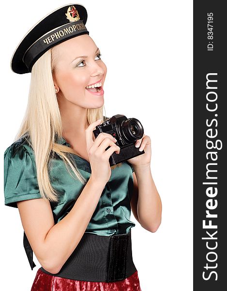 Cute blond wearing black soviet military sailor cap and holding SLR camera. Cute blond wearing black soviet military sailor cap and holding SLR camera