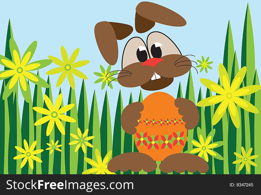 Easter bunny hidden in grass and flowers holding orange easter egg