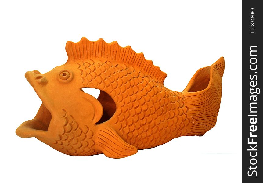 Decorative fish made of clay isolated
