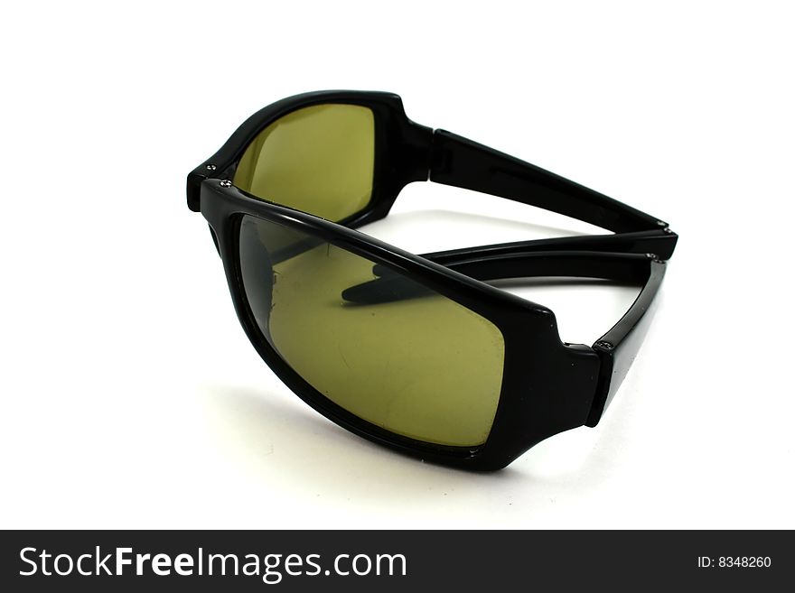 Folding sunglasses isolated on white.