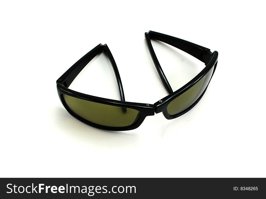 Folding sunglasses isolated on white.