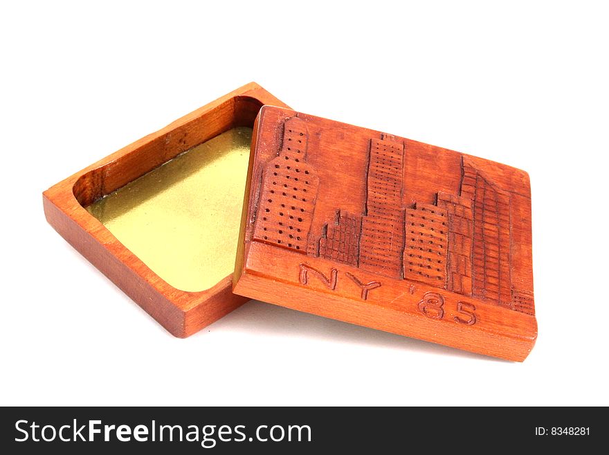 Small wood jewelry box with the skyline of New York City engraved on the top.