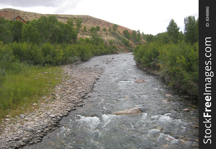 Stream in North Wyoming in September on a cloudy day. Stream in North Wyoming in September on a cloudy day.