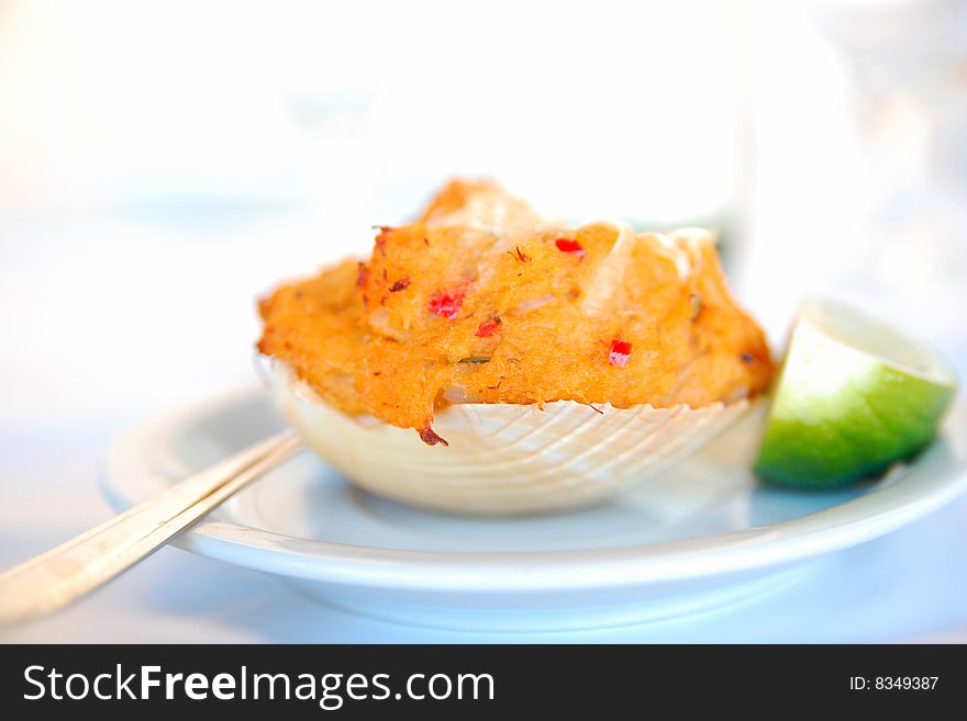 Crab meat seasoned with pepper served in the shell. Dish served throughout the tropical Brazilian coast. Crab meat seasoned with pepper served in the shell. Dish served throughout the tropical Brazilian coast.