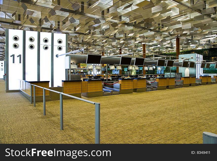 Check in row 11 counters at the local airport. Check in row 11 counters at the local airport.