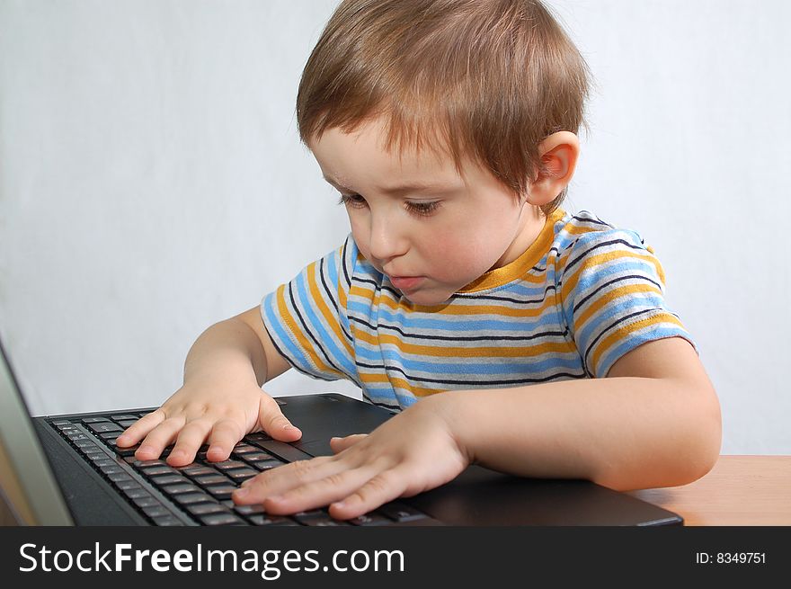 Little boy with notebook