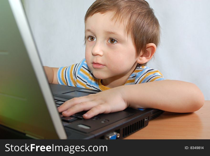 Little boy with notebook