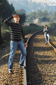 Walking On Railway Tracks Stock Photos