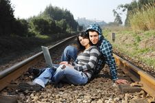 A Young Couple Standing On A Railway Royalty Free Stock Photography