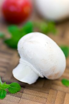 Fresh Mushrooms Isolated On A Wooden Background Royalty Free Stock Photos Fresh Mushrooms Isolated On A Wooden Background Royalty Free Stock Photos