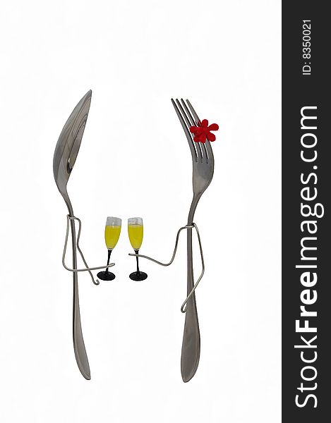 Spoon and fork with glasses on a white background. Spoon and fork with glasses on a white background.